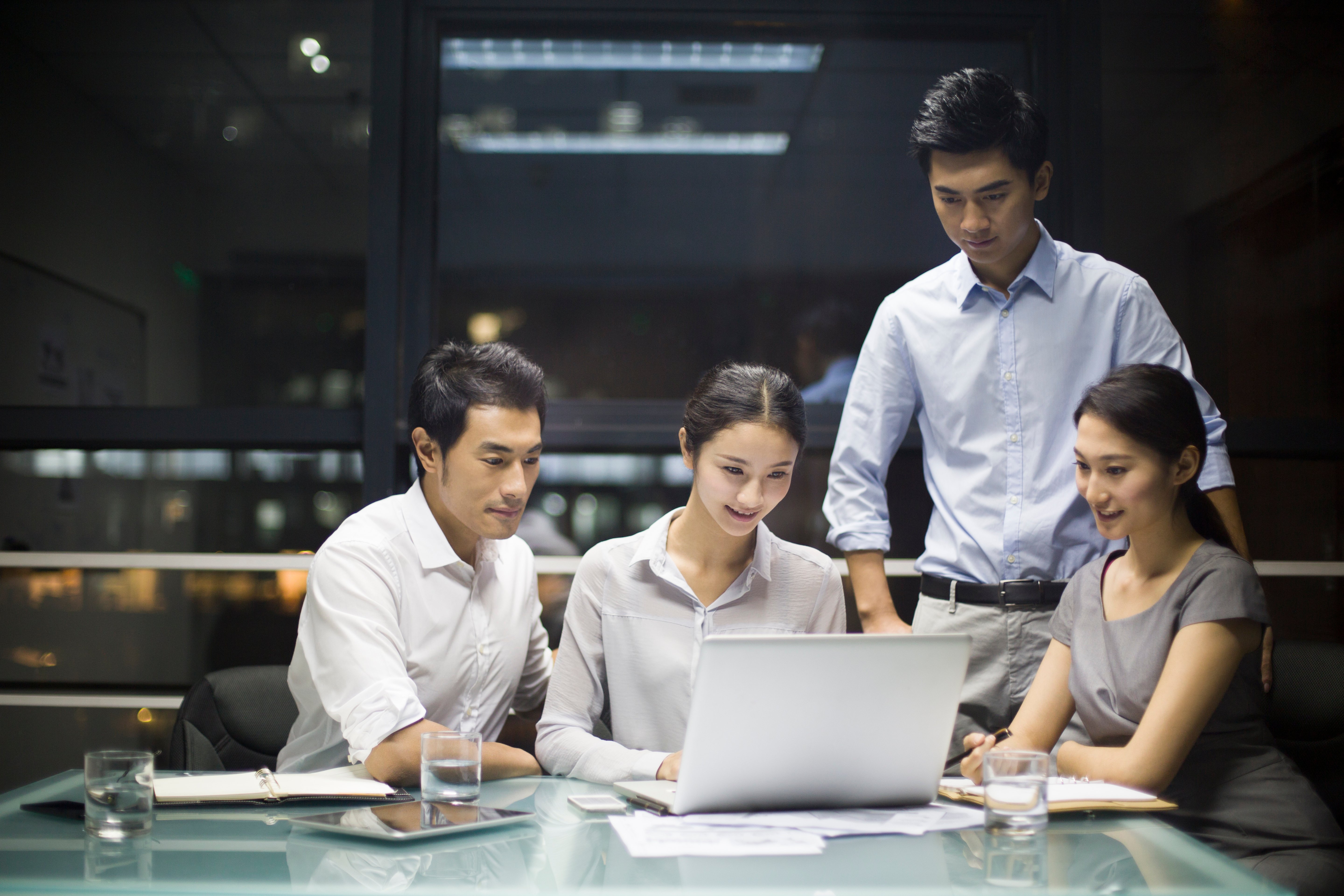 young-business-people-talking-in-meeting-2024-10-16-11-49-46-utc